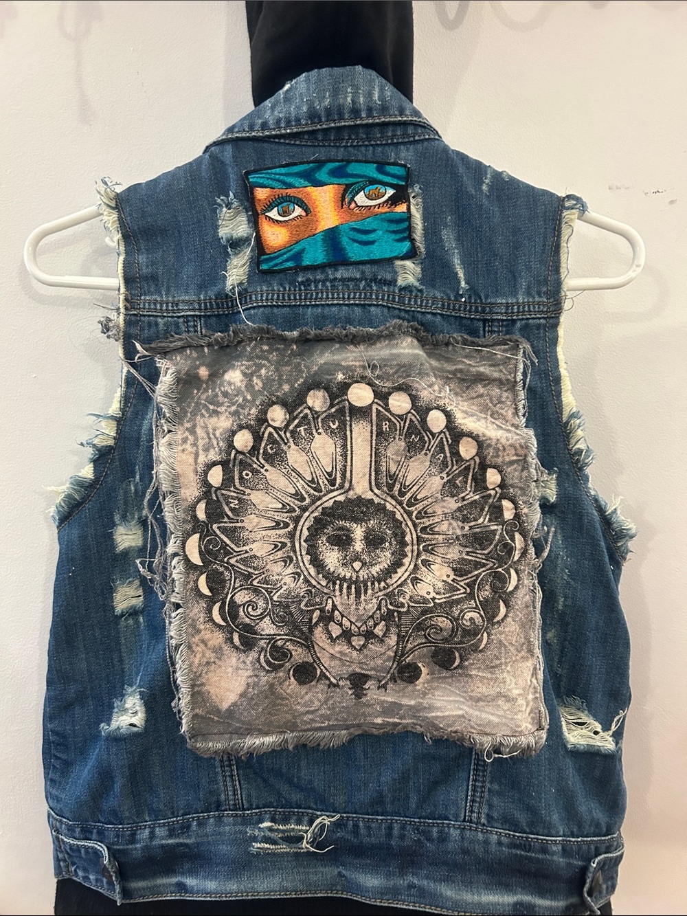 Distressed Denim Vest with Graphic Patchwork